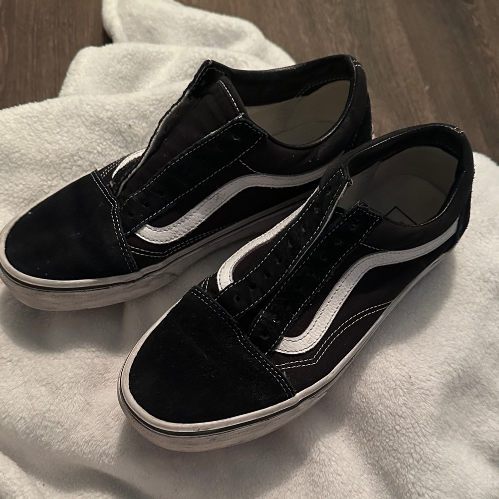 Vans Black and White Slip-On Sneakers